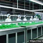 섬유기사와 텍스타일 리사이클링 - A modern textile factory interior showcasing advanced green technology in fabric dyeing: digital dye...